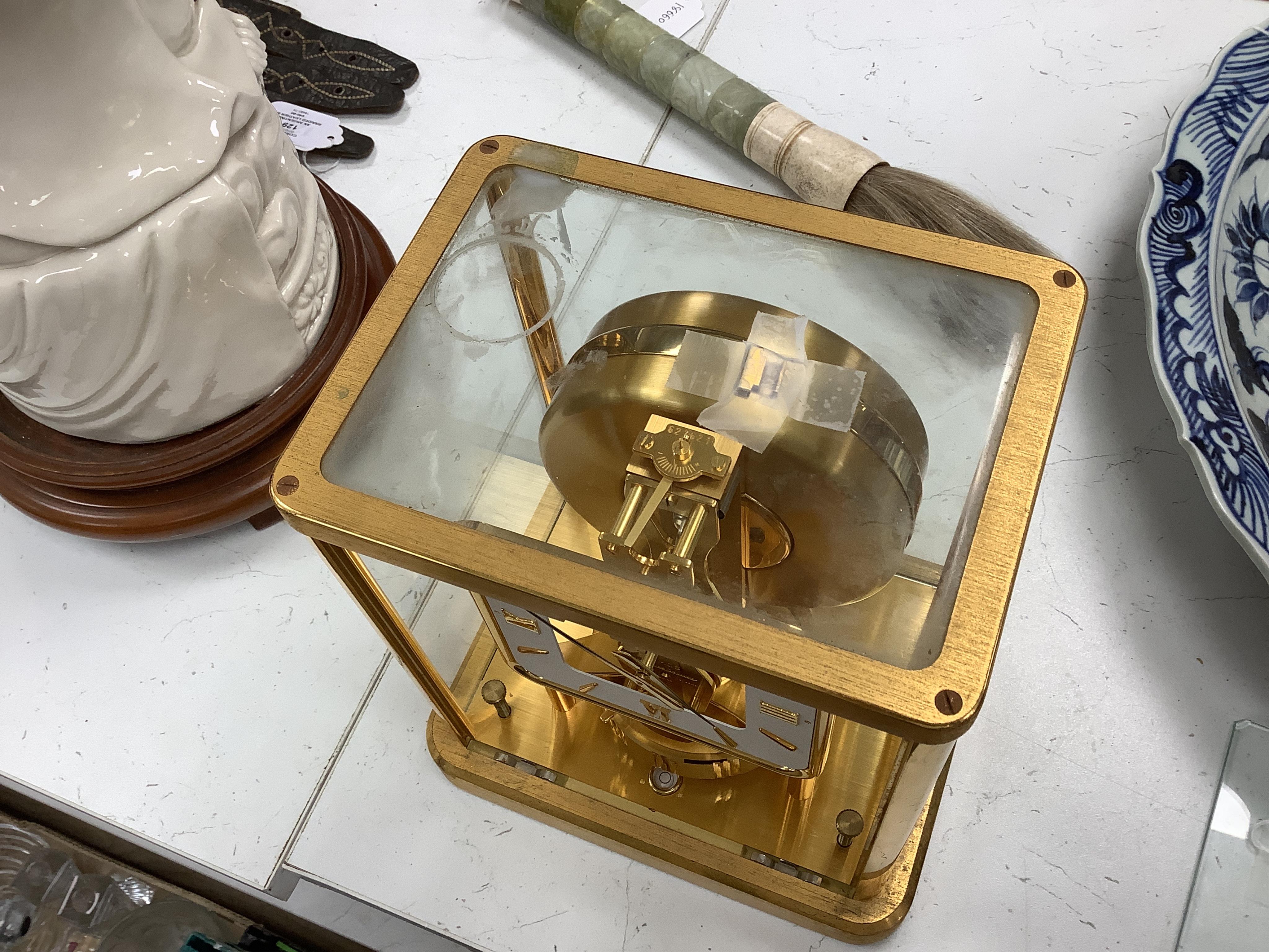 A Jaeger Le Coultre Atmos clock, numbered 627621, gilt-brass five glass case, height 22.5cm
